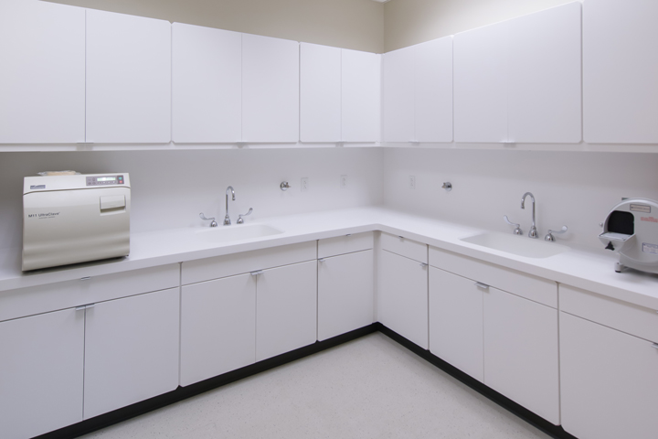 Shield manufactured solid surface casework for Dental Academy for Children. The academy knew the importance of high-quality medical casework, so they chose solid surface products.