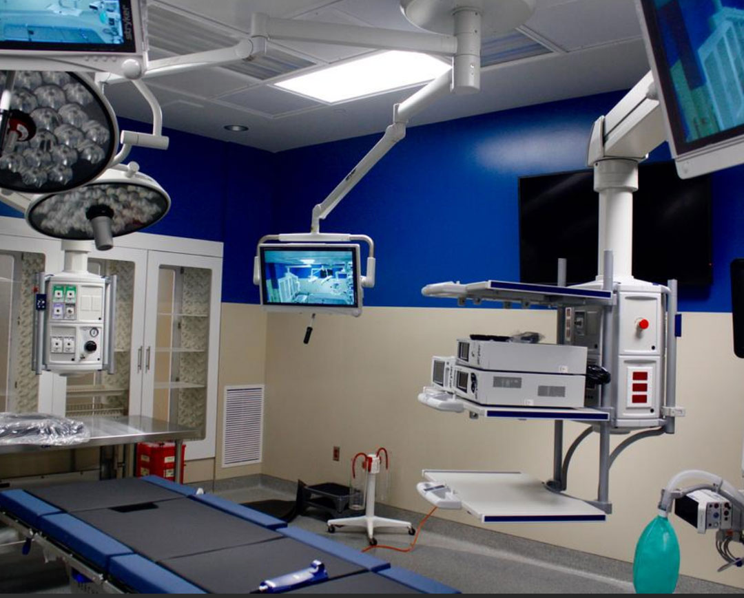 Shield Casework Healthcare acrylic solid surface full-height pass-through cabinets shown in operating room