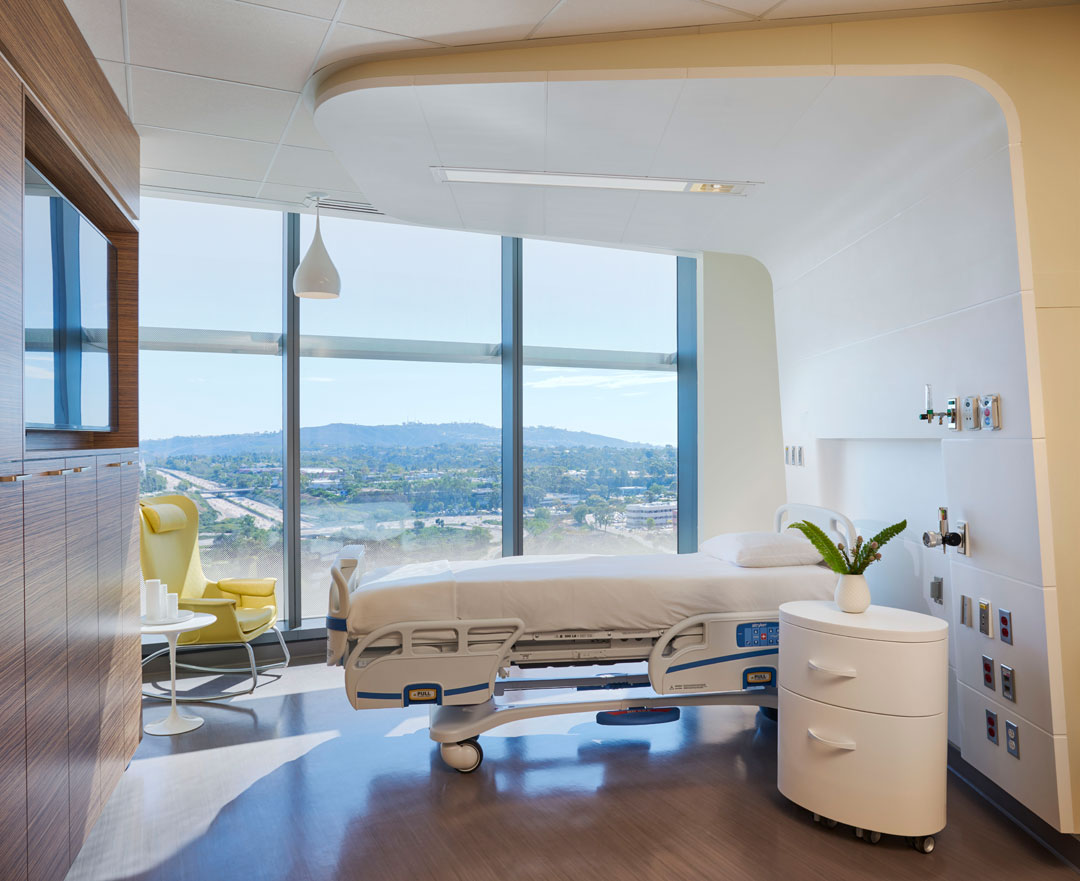 Shield Casework Healthcare patient room with custom headwall and monolith bedside cabinet